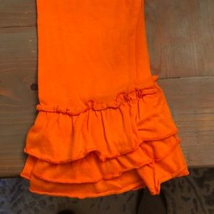 Orange like new pants.  My daughter does not like!